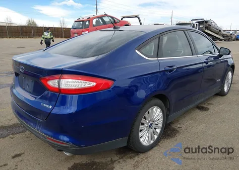 2015 Ford Fusion Hybrid S z USA, uszkodzony, nr VIN 3FA6P0UU4FR307902